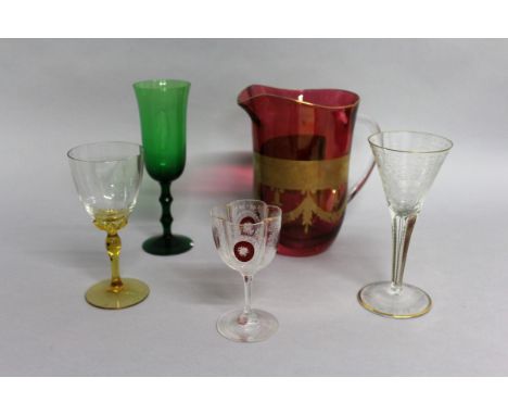 A RUBY JUG and four sundry glasses. 