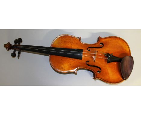 A VIOLIN by JUSTIN DERAZEY, bears label J. Derazey, LUTHIER at Mirecourt Vosges, two piece back, 23ins long overall, complete