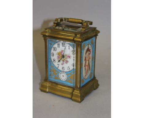 A FRENCH BRASS CARRIAGE CLOCK with repeat action and blue porcelain sides painted with cupids and trophies. 6ins high. 