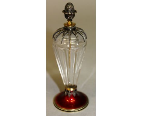 A SUPERB RUSSIAN SILVER, RED ENAMEL AND DIAMOND SET SCENT BOTTLE with circular base, fluted crystal and pineapple finial, 4.5