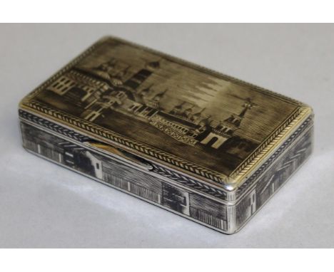 A RUSSIAN SILVER NIELLO RECTANGULAR SNUFF BOX, the top, bases and sides decorated with KREMLIN, 7cms wide. Stamped .84. Initi