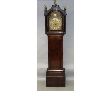 AN 18TH CENTURY OAK EIGHT DAY LONGCASE CLOCK, with arched brass dial, silvered chapter ring, subsidiary seconds dial, date ap