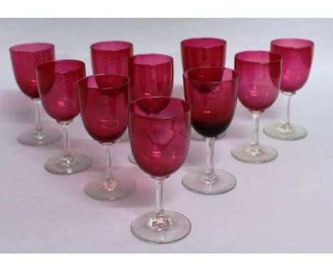 A NEAR MATCHING SET OF TEN RUBY GLASS WINE GLASSES. 