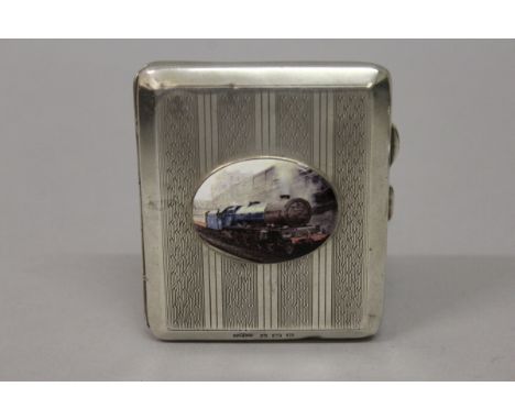 A GEORGE V SILVER ENGINE TURNED CIGARETTE CASE, the lid with an oval of a steam tractor. Birmingham 1926. 