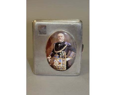 AN ELIZABETH II ENGINE TURNED SILVER CIGARETTE CASE, the lid with an oval of a Grand Master, the inside engraved Ladies Festi