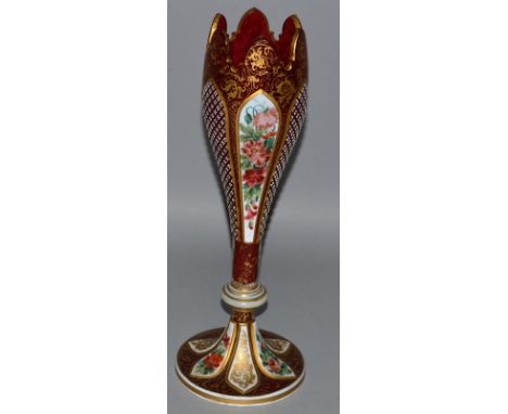 A GOOD 19TH CENTURY BOHEMIAN RUBY GLASS TALL VASE decorated in gilt with six reverse panels, white overlay and panels of flow