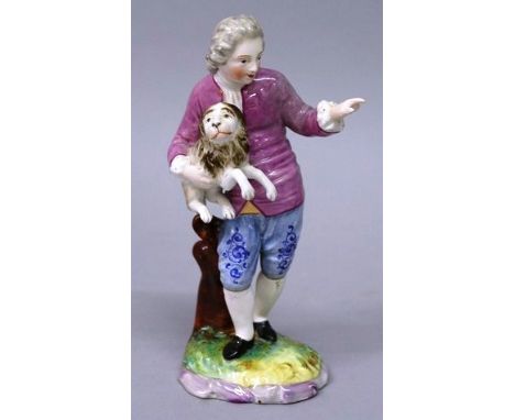 A CAPO DI MONTE FIGURE OF A MAN wearing a blue cloak and another group of a young man carrying a dog. 7ins high. 