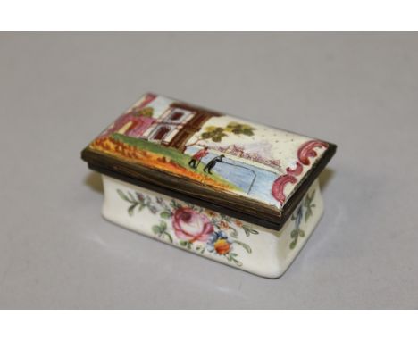 A BILSTON RECTANGULAR ENAMEL SNUFF BOX painted with a river landscape and flowers. 2.5ins. 