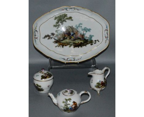 A GOOD EARLY 19TH CENTURY MEISSEN CABARET SET comprising large oval tray, 12ins long, globular teapot and cover, circular sug