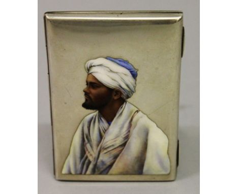 A GOOD SILVER AND ENAMEL FOLDING CALLING CARD CASE, CIRCA. 1900, with a fitted leather interior, the cover with an enamel por