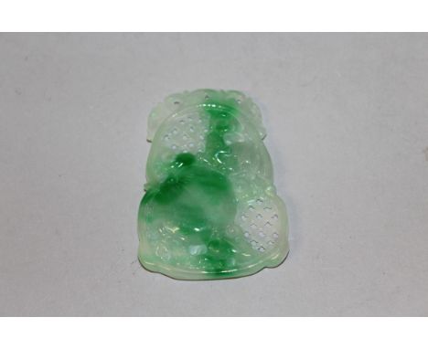 A CHINESE PIERCED JADE PENDANT. 2.25ins. 
