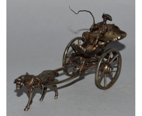 A CONTINENTAL SILVER GROUP, HORSE AND CARRIAGE. 4ins long. 