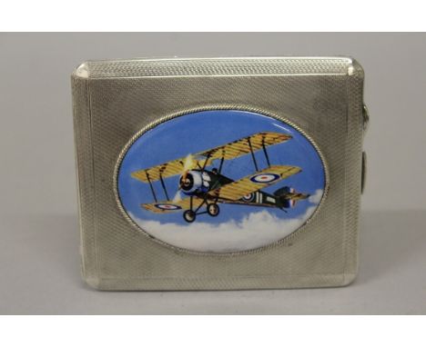 AN EDWARD VII ENGINE TURNED SILVER CIGARETTE CASE, the lid with an oval of a biplane. Chester 1902. 
