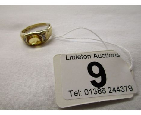 Gold citrine and diamond set ring