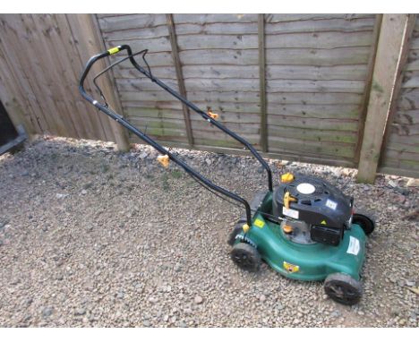 Working petrol rotary mower