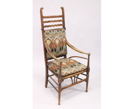 A GOOD LIBERTY RUSTIC ARM CHAIR with Liberty print padded back and seat.