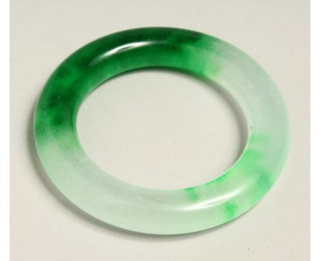 A TWO TONE JADE BANGLE