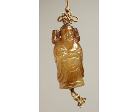 A CARVED JADE GOLD PENDANT. 2.25ins long.
