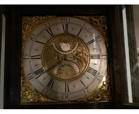 Thomas Lister, Luddenden. An 18th century oak long case clock, the case with moulded pediment surmounted by globes and spread