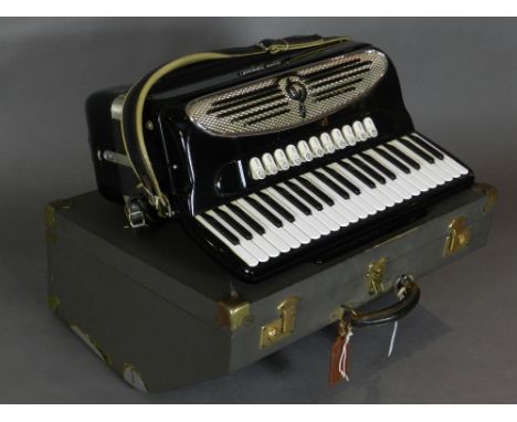 A Giulietti classic 127 accordion by Bell Musical Instruments Ltd., cased.