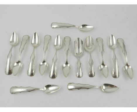 A set of twelve late 19th century Dutch silver teaspoons with two matching caddy spoons, reeded scroll handles in rectangular