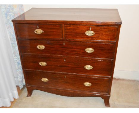 A 19th century mahogany chest, the rectangular top with reeded edge above two short and three long graduated and cockbeaded d