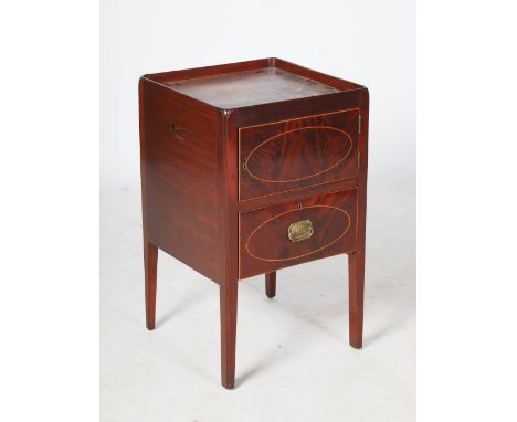 A 19th century mahogany and boxwood lined tray top commode, with raised gallery top above a cupboard door and single drawer, 