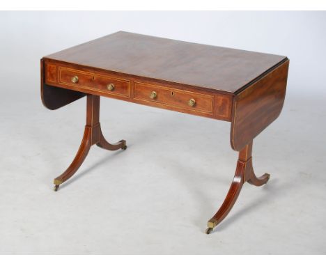 A 19th century mahogany and boxwood lined sofa table, the rectangular top with twin drop leaves above two frieze drawers back