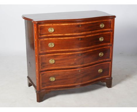 A 19th century mahogany and boxwood lined serpentine chest, the shaped rectangular top with a moulded edge above four long gr