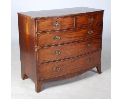 A 19th century mahogany and ebony lined bow front chest, the shaped rectangular top with reeded edge, above two short and thr