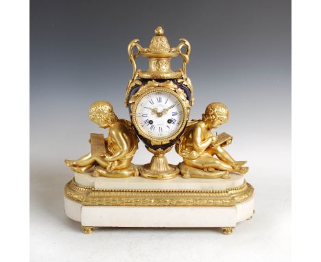 A late 19th century French ormolu, marble and cobalt blue porcelain mounted mantle clock, the dial inscribed E. DE LABROUE, P