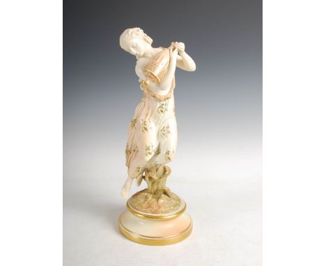A Royal Worcester figure group dated 1902, modelled with a female water carrier, green printed marks and number '2', 40cm hig