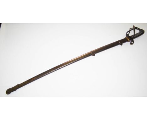 A 19th century Cavalry Officers sword, with etched blade, wire bound fish skin grip and metal scabbard, blade length 85cm lon