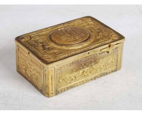 A late 19th/ early 20th century German gilt metal singing bird box automaton, Cohen J. MUNCHEN, the hinged oval cover opening