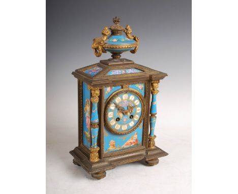 A late 19th century French ormolu and porcelain mounted mantle clock, the circular dial with Roman numerals and painted merma