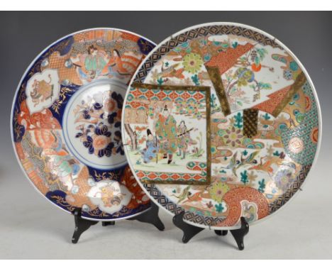 Two Japanese Imari chargers, Meiji Period, one decorated with panels of Samurai and birds, 46cm diameter, the other decorated