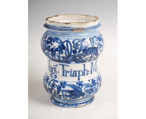 An 18th century Delft pottery albarello shaped apothecary jar, inscribed 'Vng: Triaph: Mage:' within foliate borders decorate