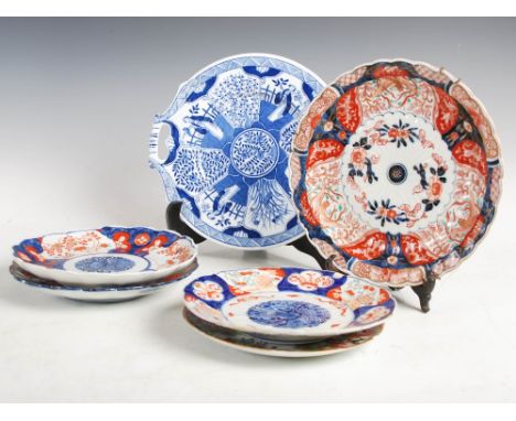 A collection of Japanese and Chinese plates, comprising; an Imari dish 25.5cm diameter, three assorted Imari plates 21.5cm di