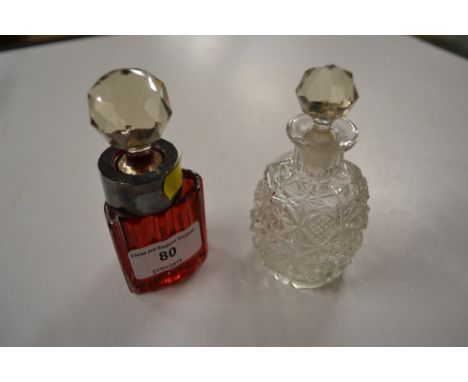 A ruby glass scent bottle; and one other scent bottle 