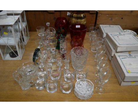 A quantity of various glassware to include a large gilt decorated goblet, ruby glass vase etc. 