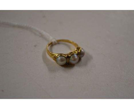 An antique yellow metal, diamond and pearl ring