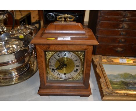 A modern German three hole mantel clock