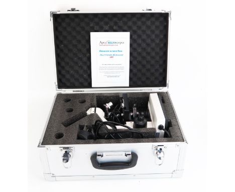 An Apex monocular microscope, with two eyepieces, course and fine focusing, rotating triple nose with three objectives, mecha