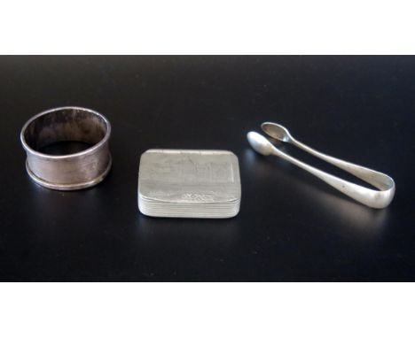 A silver napkin ring, a pair of silver sugar tongs, and a Cornish pewter castle top snuff box. weighable silver 26gms, 0.84oz