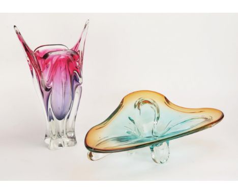 After a design by Josef Hospodke, an art glass cats head ear vase, in mauve and purple, 38cm high and a Murano glass table ce