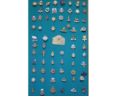 A collection of British and Commonwealth army cap badges including 19th P.W.O Hussars, Coldstream Guards 2655366 L E CLODE br
