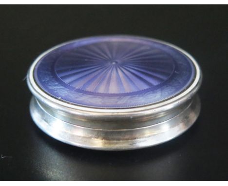 A continental silver and lilac enamel circular rouge pot (enamelled on both sides), 5cm diameter, 41gms, 1.33ozs