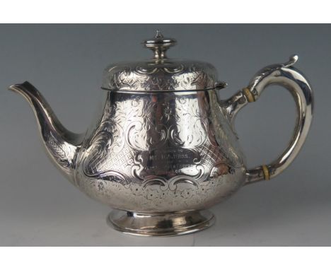 A Victorian silver teapot, maker Robert W Smith, Dublin, 1849, inscribed, of squat ovoid form, with domed hinged lid, acanthu