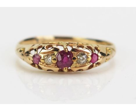 An 18ct Gold, Ruby and Cushion Cut Diamond Five Stone Ring, central stone c. 3.5mm, rubbed Birmingham hallmarks (early 20th c