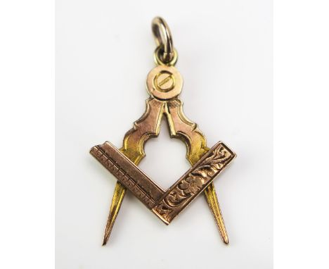 A 9ct Gold Masonic Fob in the form of a square and compass with chased decoration, hallmarked 32mm drop, 2.31g 